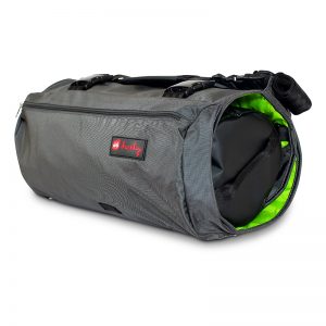 Compact messenger bag for commuting or travel in grey with fluro green inside.