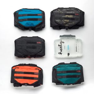 5 Enduro 2.0 hydration packs in blue, camo, black, orange and teal. Henty hydrapak.