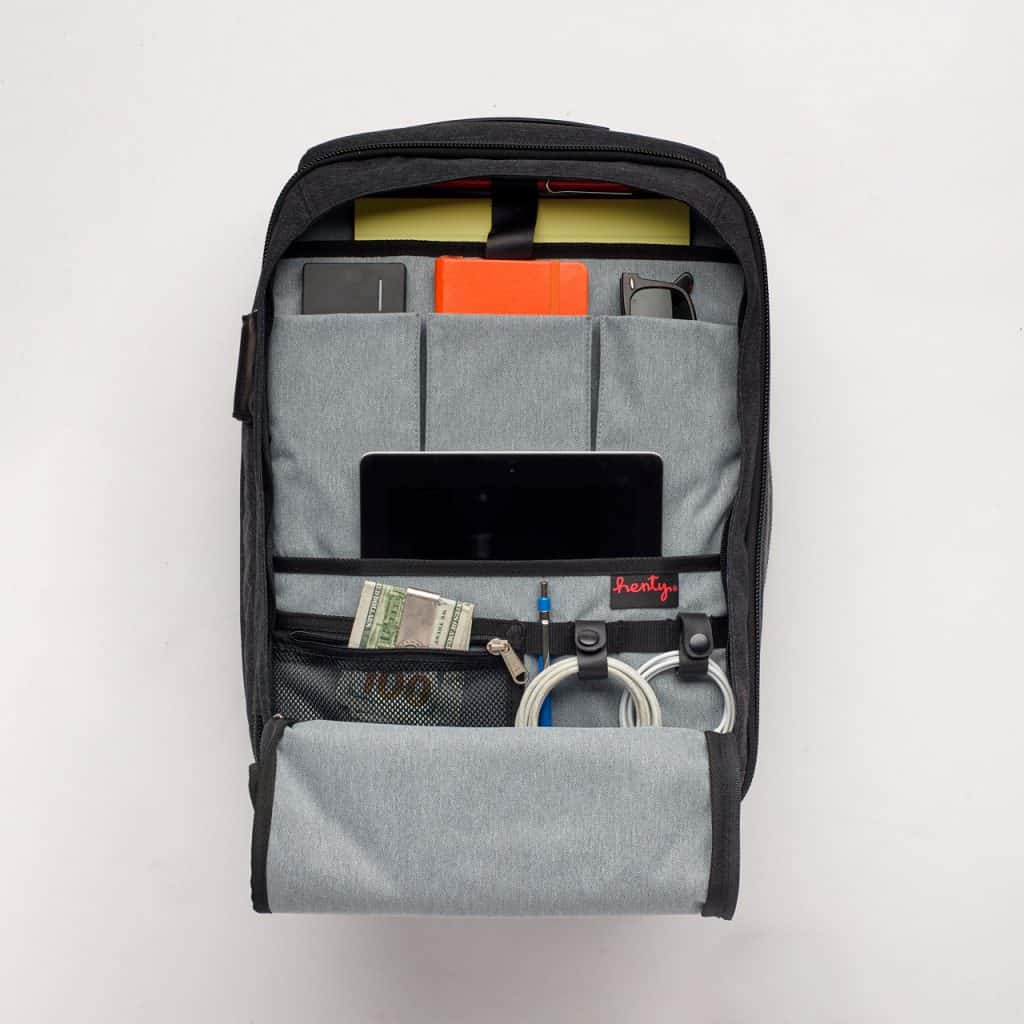 Travel Brief travel backpack can hold tablet, sunglasses, notebooks, phone, money, cords, pens, and much more.